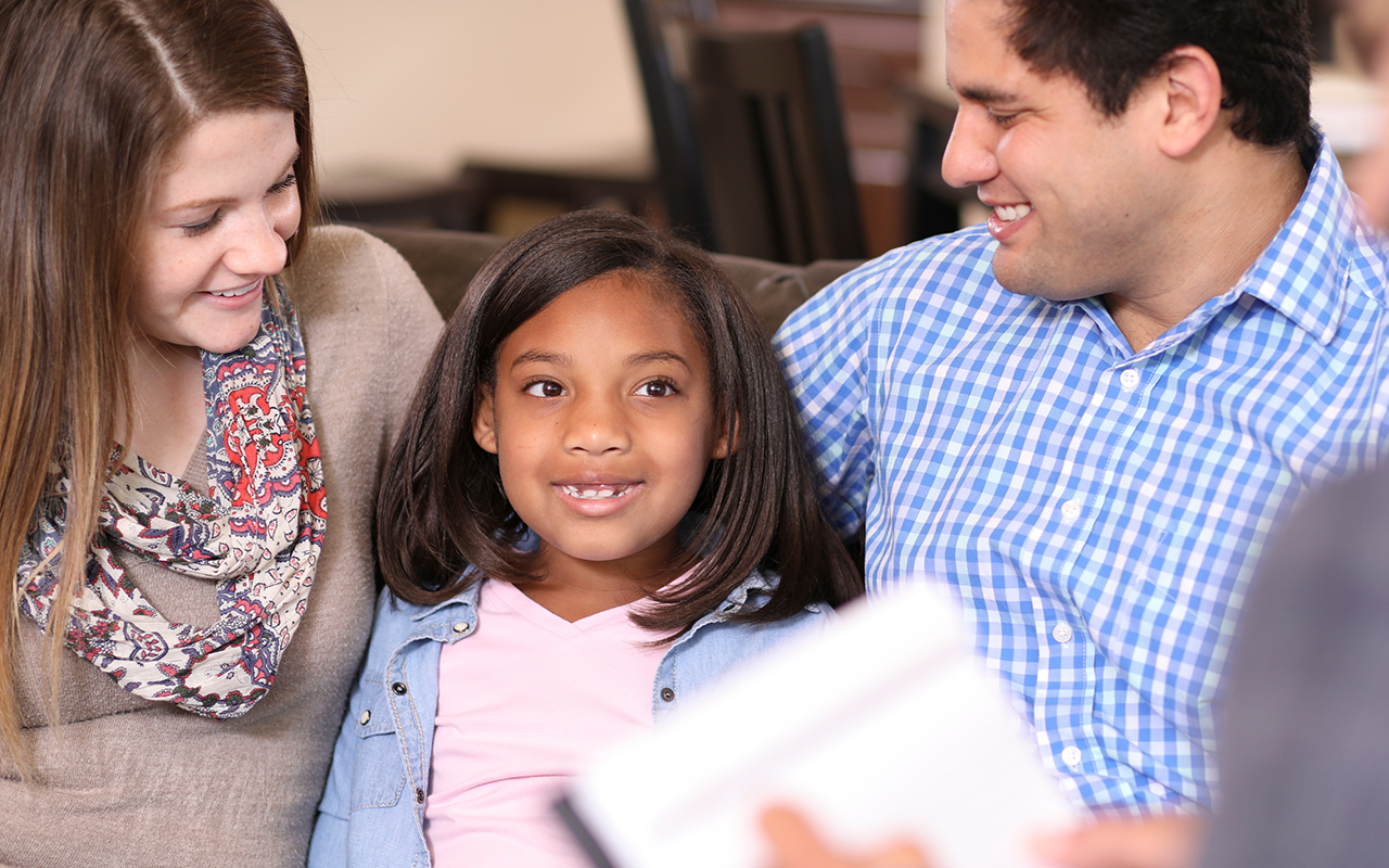 Couple with child in therapist office